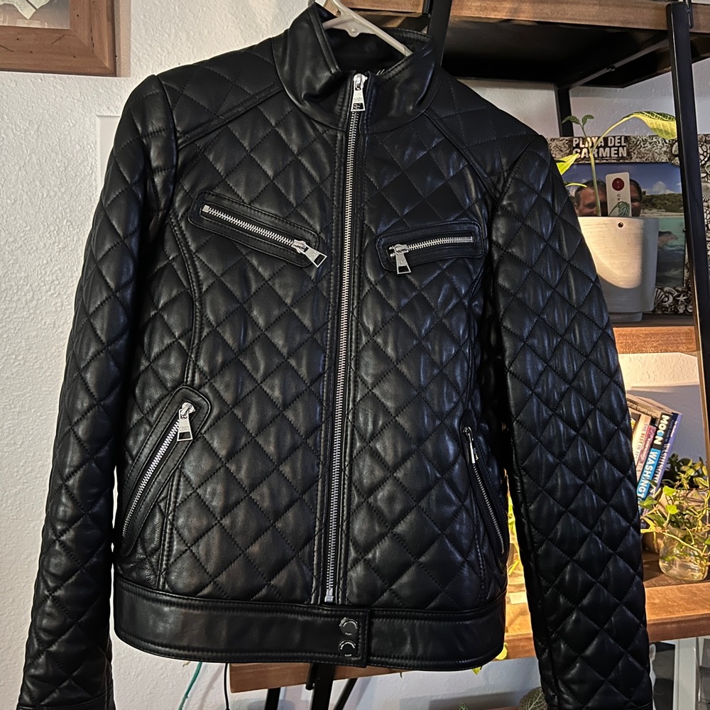 Karl Lagerfeld black leather moto jacket. Size small in like new condition.